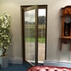 Fully glazed finished oak external single door. Photo taken from the inside (1981mm x 838mm)