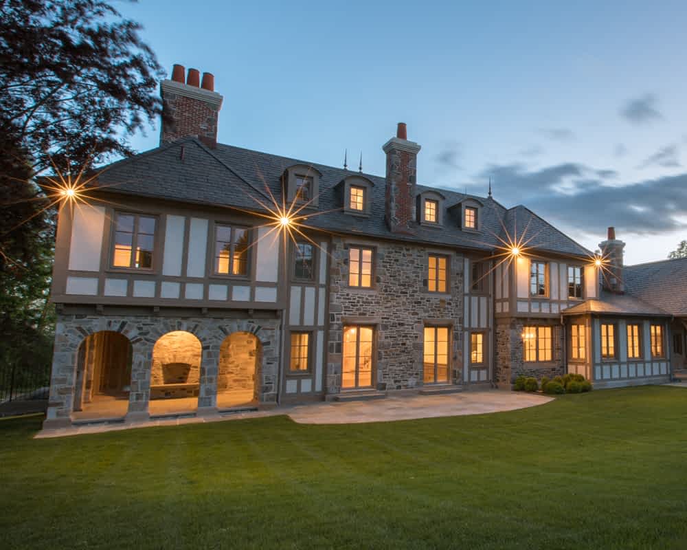 Mansion with a big lawn in the evening