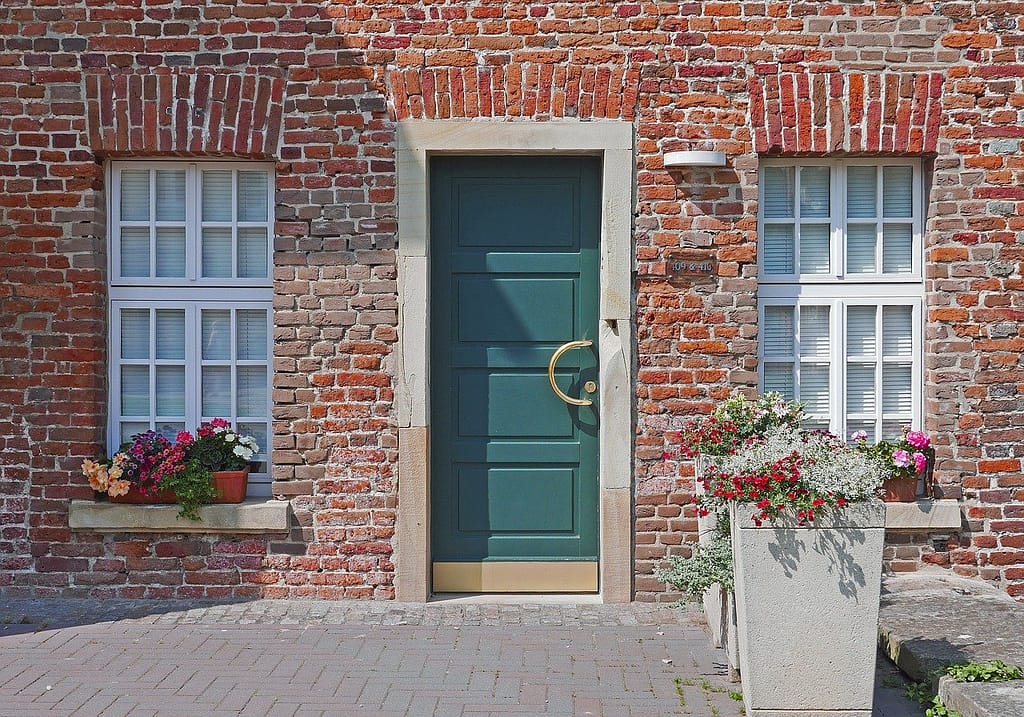 Brick house with door lintels and window lintels