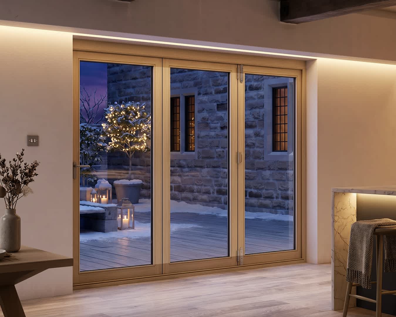 Bifold doors looking out onto a wintery garden