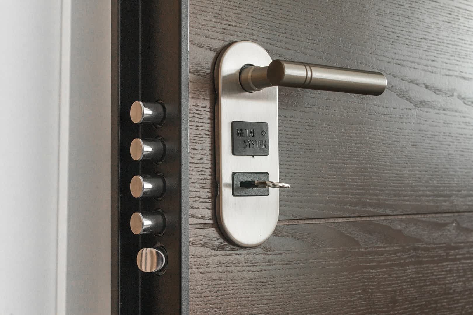 a smart lock on a black door