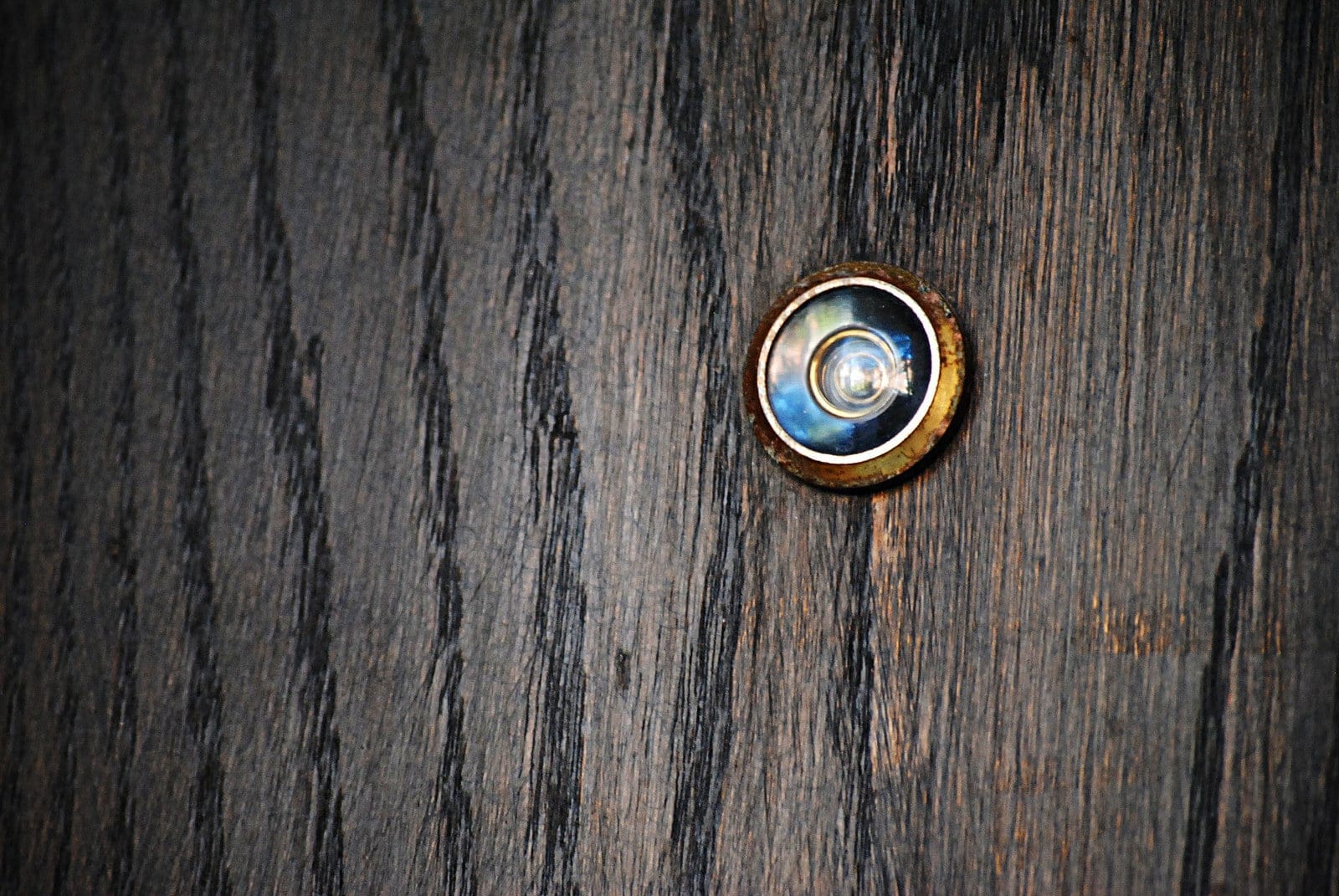 peephole in wooden door
